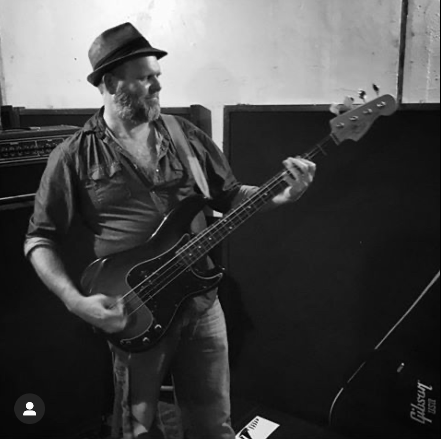 Frank Barnhardt playing bass guitar